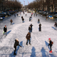 People skate on the frozen Keizersgracht canal in Amsterdam in 2012. Image: AP Photo/Margriet Faber